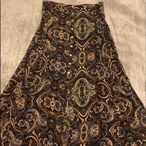 brown, black, cream, blue skirt